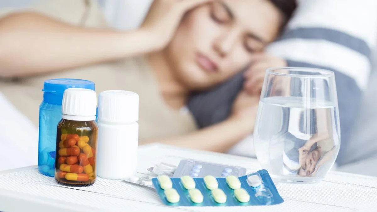 Empty pill bottles scattered on a table, depicting the aftermath of Seconal abuse.