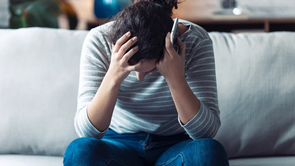 A patient in a medical setting consulting with a doctor on a Xanax addiction treatment plan.